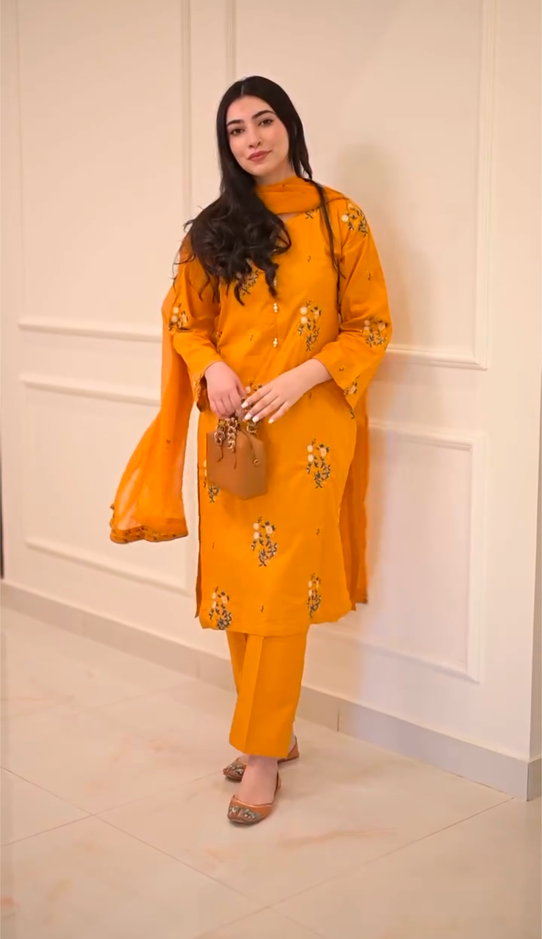 Screenshot_20250805-030419.png Mustard Floral Embroidered 3-Piece stitched Cotton Suit - Image 1